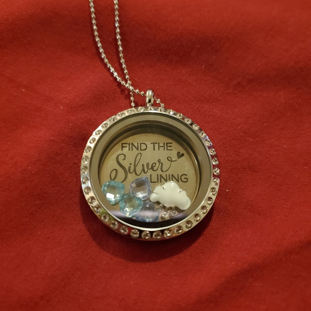 Silver lining locket necklace.